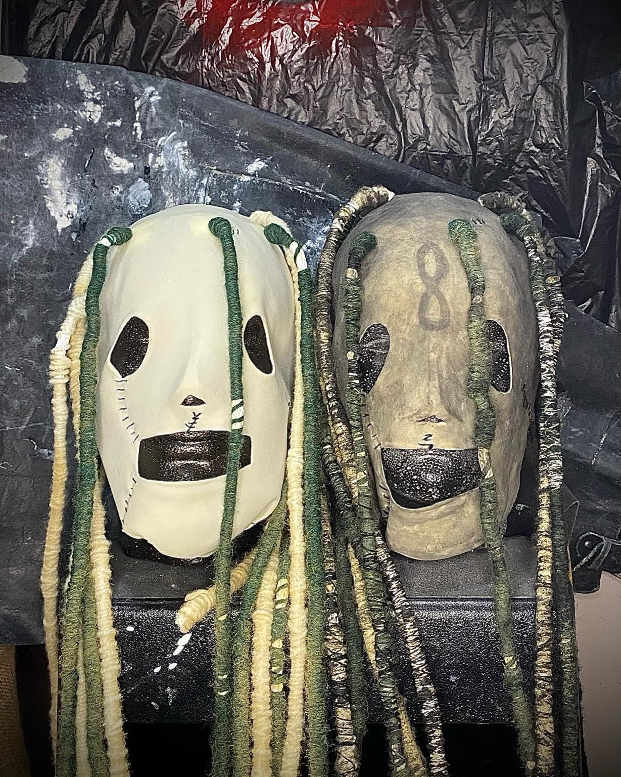 Two finished Slipknot Self-Titled Corey Taylor replica masks, front view